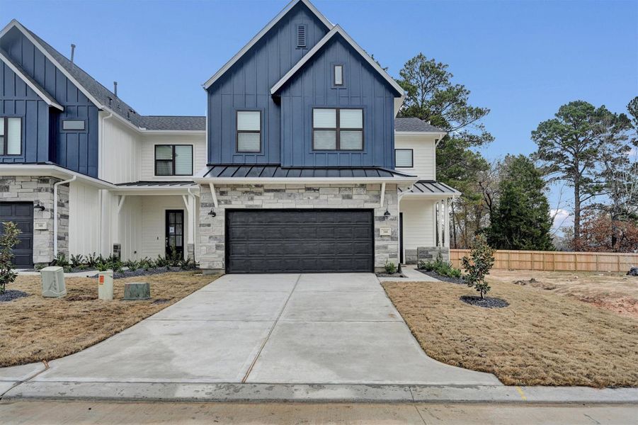 Front exterior of a new home in Summer Place  35', Montgomery, TX, highlighting curb appeal (Image 25).