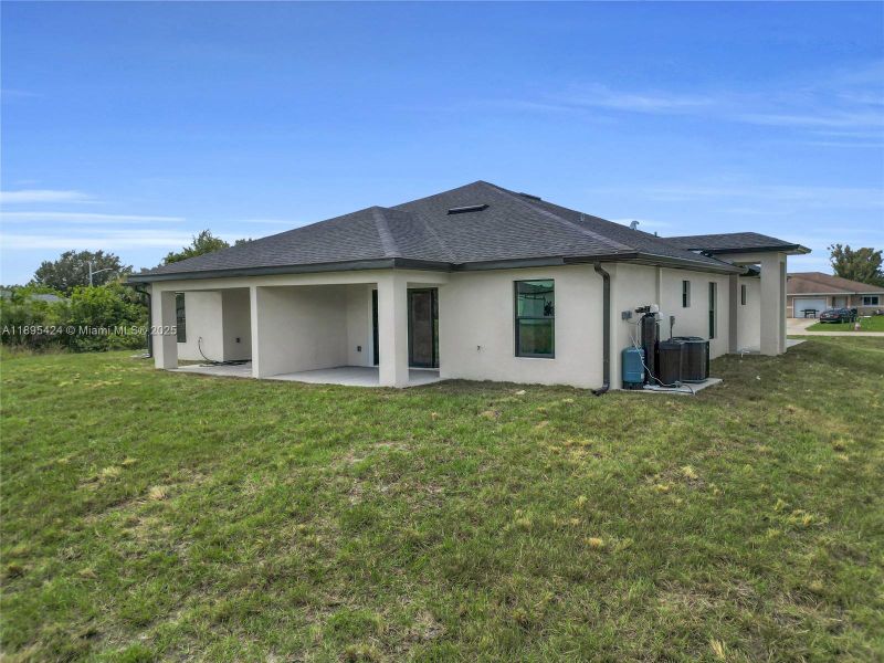 Exterior details and patio area of a home in , Lehigh Acres (Image 17). Exterior details and patio area of a home in , Lehigh Acres (Image 17).