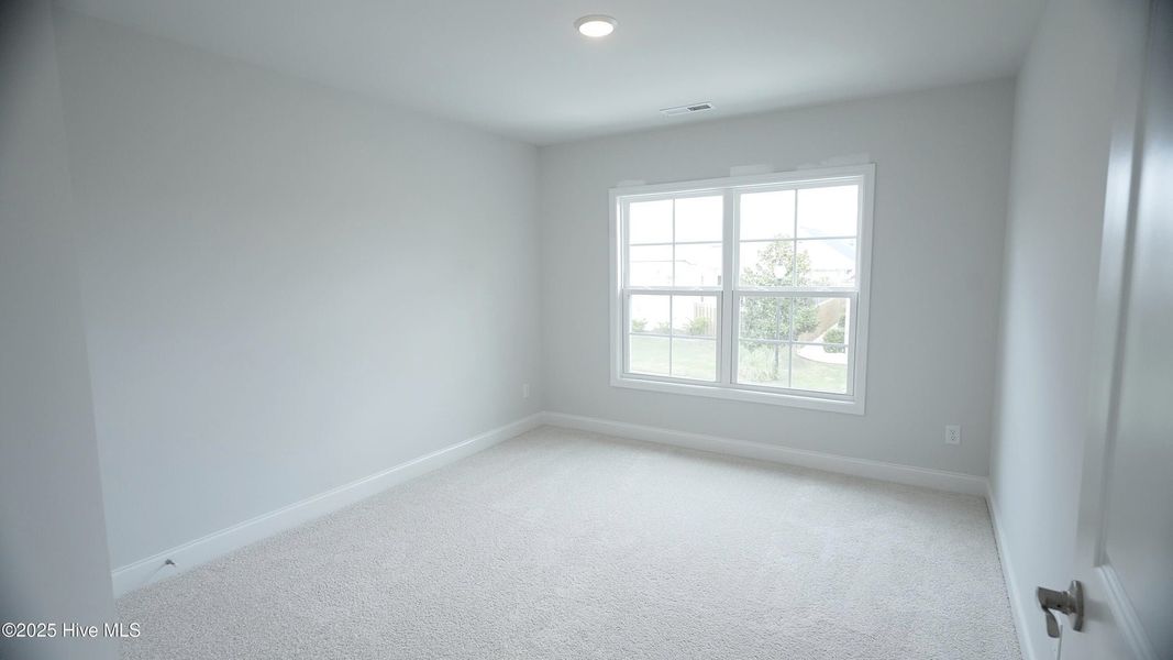 Spacious, unfurnished interior of a new home in Palmetto Creek, Bolivia (Image 30).