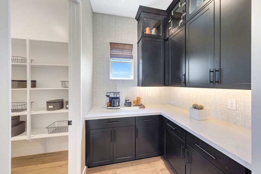 Representative furnished interior of a home built from the Mahogany by Mattamy Homes in Miravida, Surprise (Image 17).