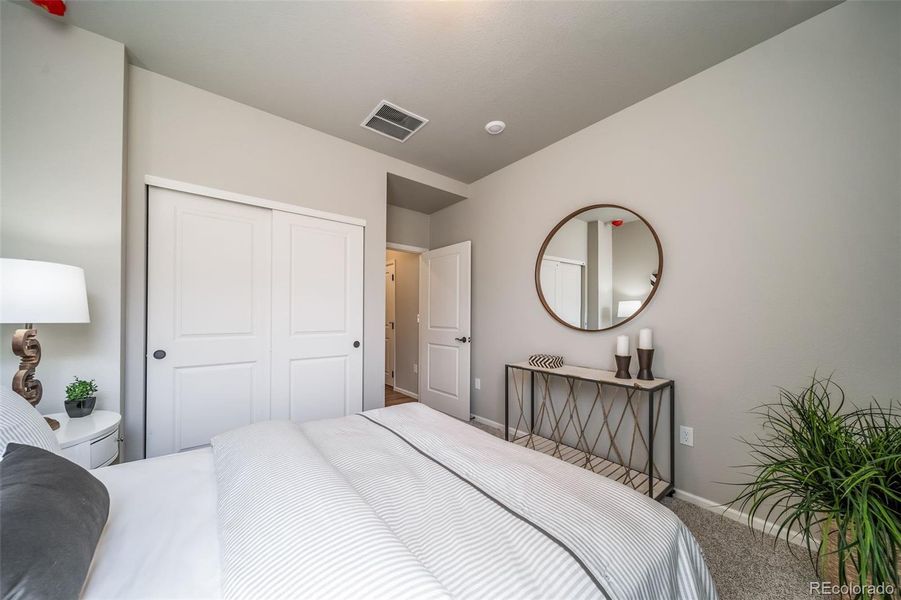 Furnished interior view inside a new home in The Reserve, Aurora (Image 23).