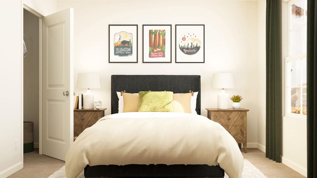 A bedroom with a bed and lamps.