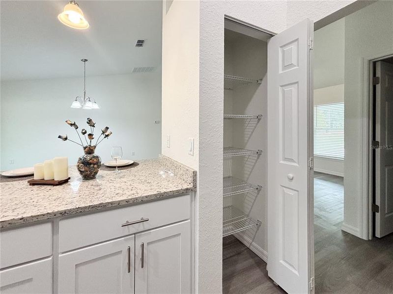 Furnished interior view inside a new home in , Dunnellon (Image 40).