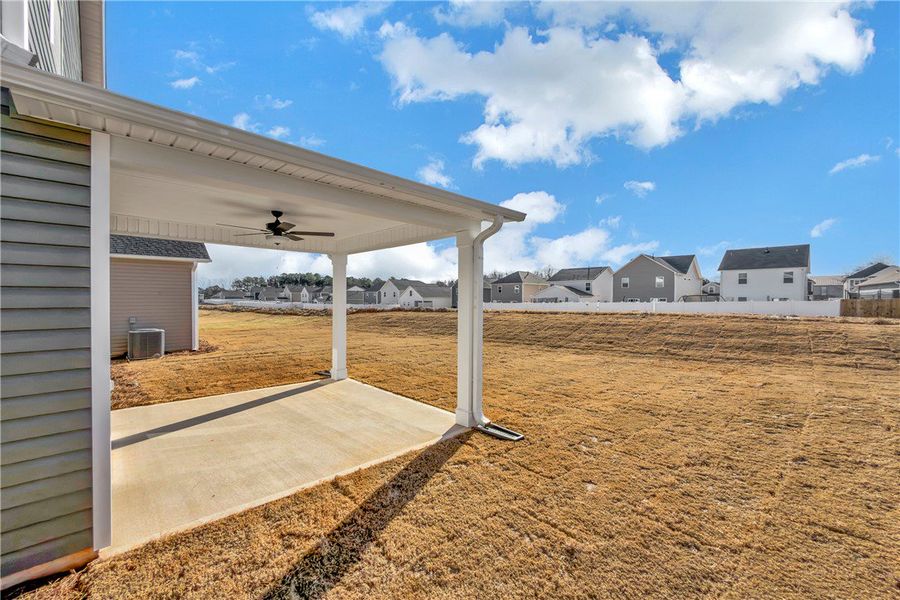 Exterior details and patio area of a home in Brownstone Park, Easley (Image 4).