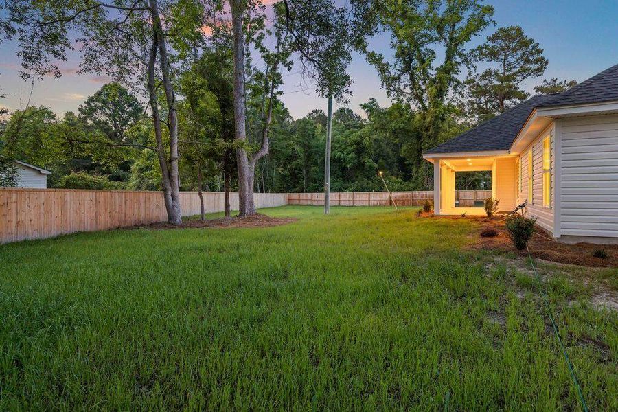 Exterior details and patio area of a home in , Awendaw (Image 35).