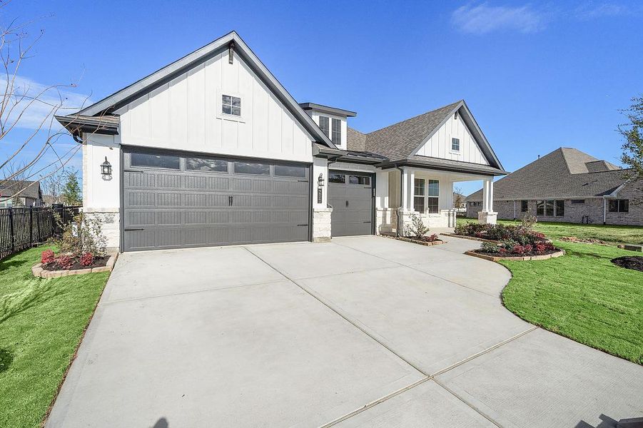 Representative exterior photo of a completed home built from the Dogwood by Caldwell Homes in The Highlands, Porter, TX (Image 25). Representative exterior photo of a completed home built from the Dogwood by Caldwell Homes in The Highlands, Porter, TX (Image 25).