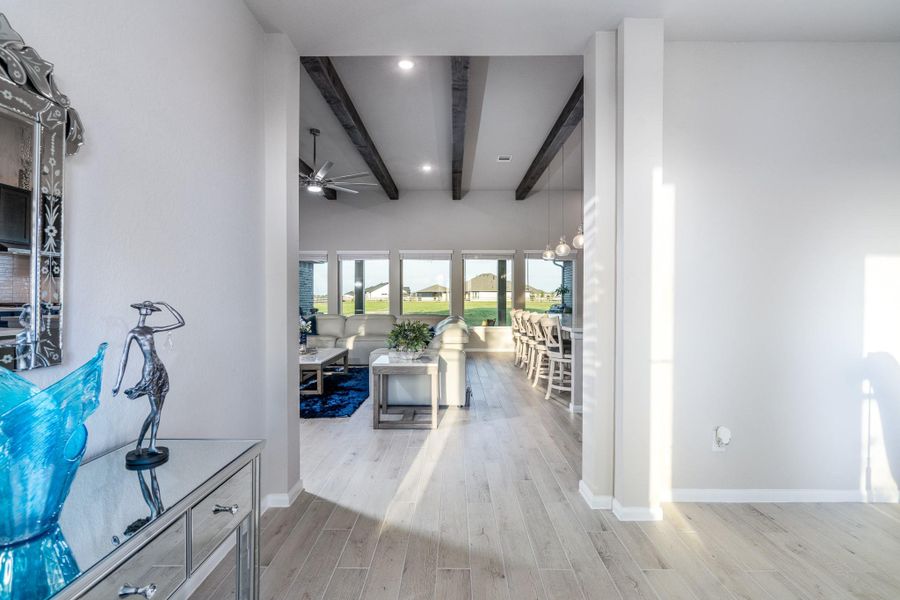 Come discover this elegant & relaxing semi custom home w/an open flowing floorplan