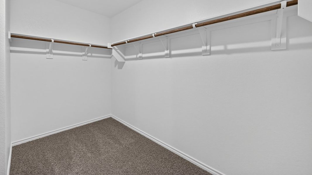 Representative unfurnished interior of a home built from the Texas Cali by D.R. Horton in Whitewing Trails, Princeton (Image 20).