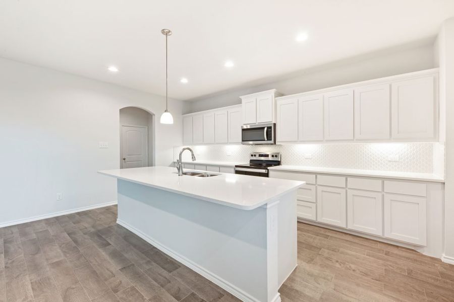 Representative exterior photo of a completed home built from the Radcliffe II by Impression Homes in Stone Eagle, Azle, TX (Image 7).