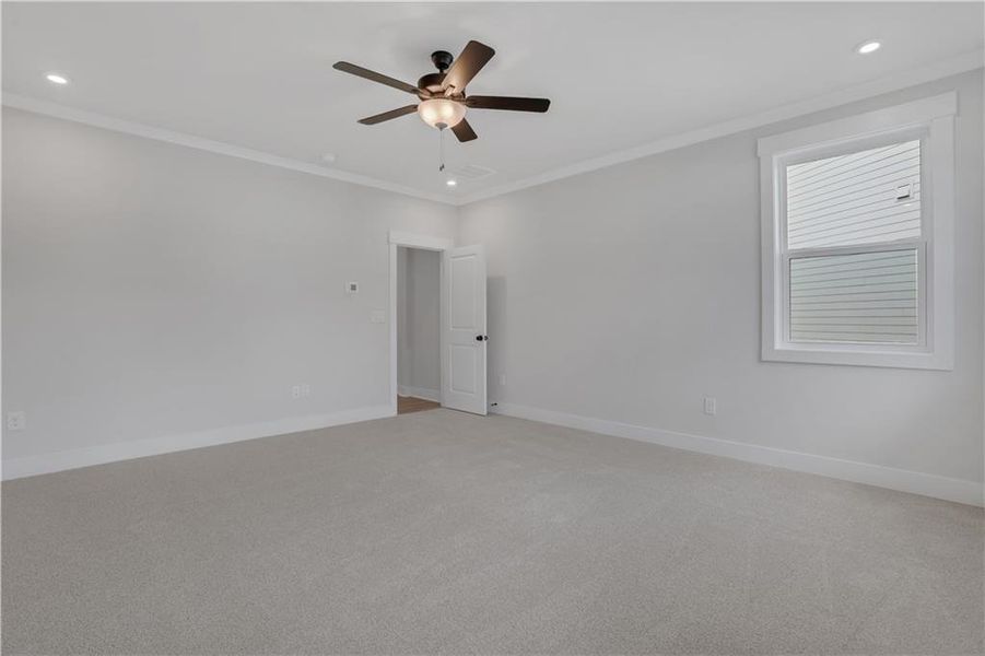 Spacious, unfurnished interior of a new home in The Paddocks at Doc Hughes, Buford (Image 34).