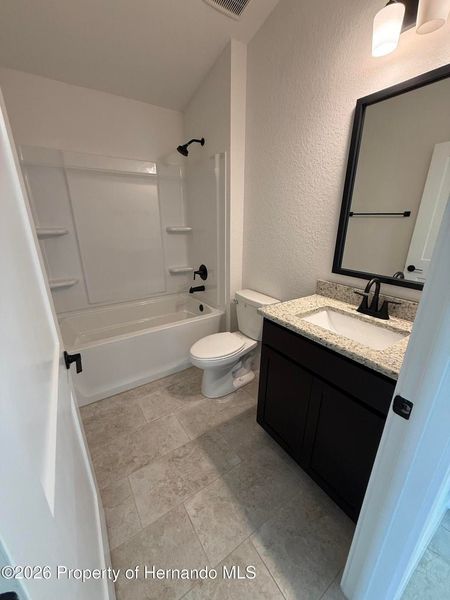 Furnished interior view inside a new home in Winding Oaks, Weeki Wachee (Image 4).