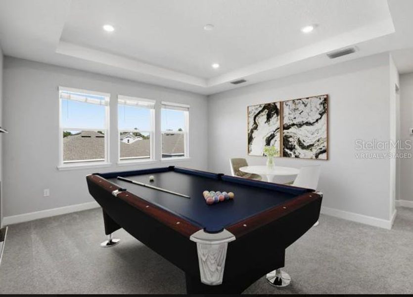 Furnished interior view inside a new home in Harvest at Ovation, Winter Garden (Image 9).