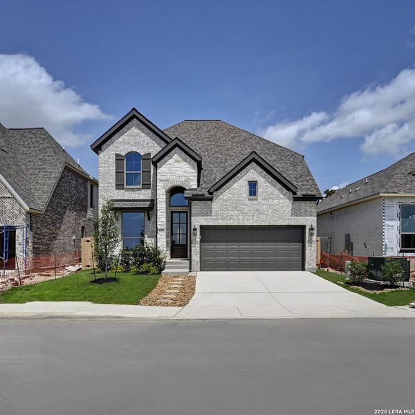 Front exterior of a new home in Kallison Ranch, San Antonio, TX, highlighting curb appeal (Image 2).