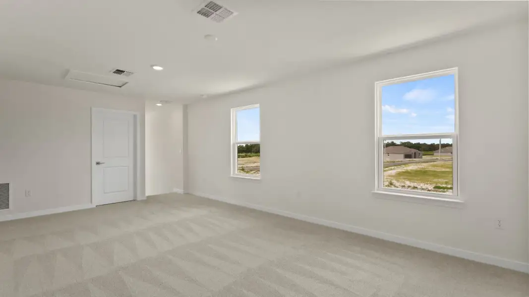 The Naples Second Floor Loft Space in Quick Move-In Home at Willowbrook North by DRB Homes in Winter Haven, FL