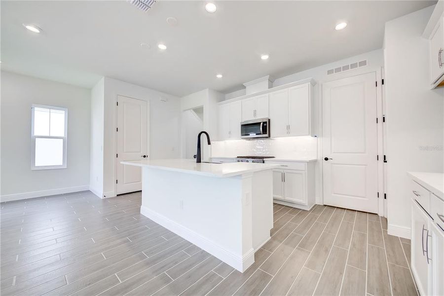 Furnished interior view inside a new home in Bungalow Walk at Lakewood Ranch, Lakewood Ranch (Image 9).