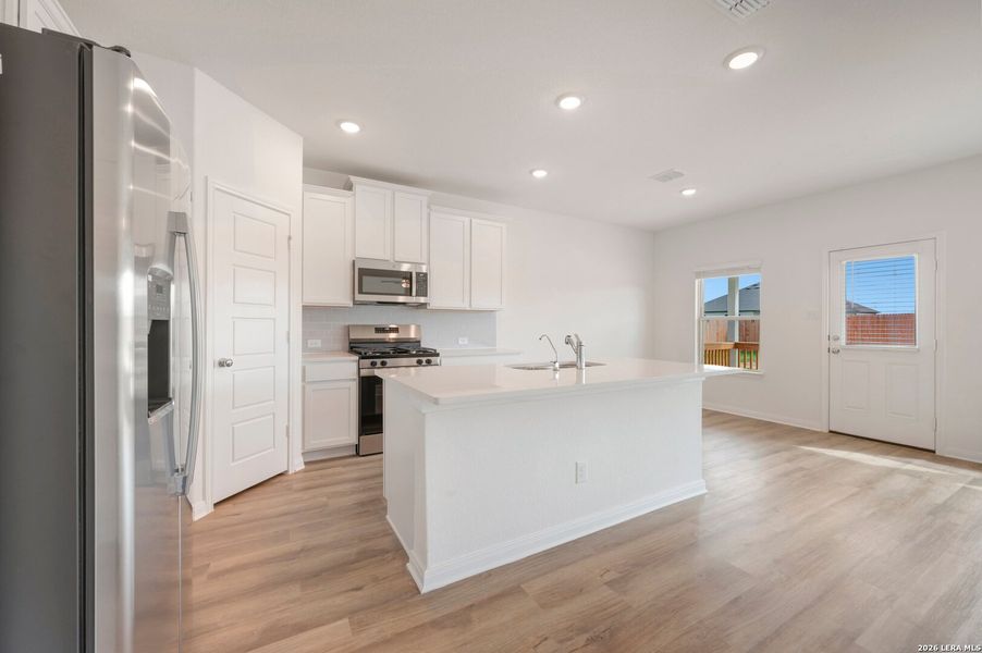 Furnished interior view inside a new home in Hickory Ridge Estates, Elmendorf (Image 5).