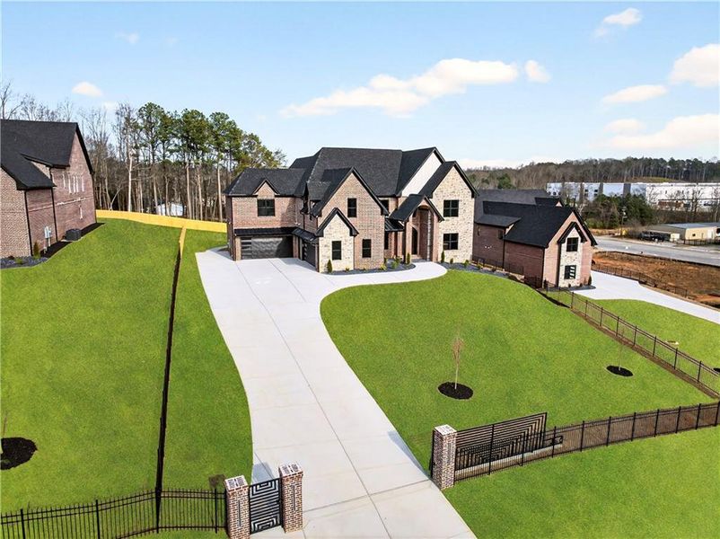 Front exterior of a new home in , Buford, GA, highlighting curb appeal (Image 2). Front exterior of a new home in , Buford, GA, highlighting curb appeal (Image 2).