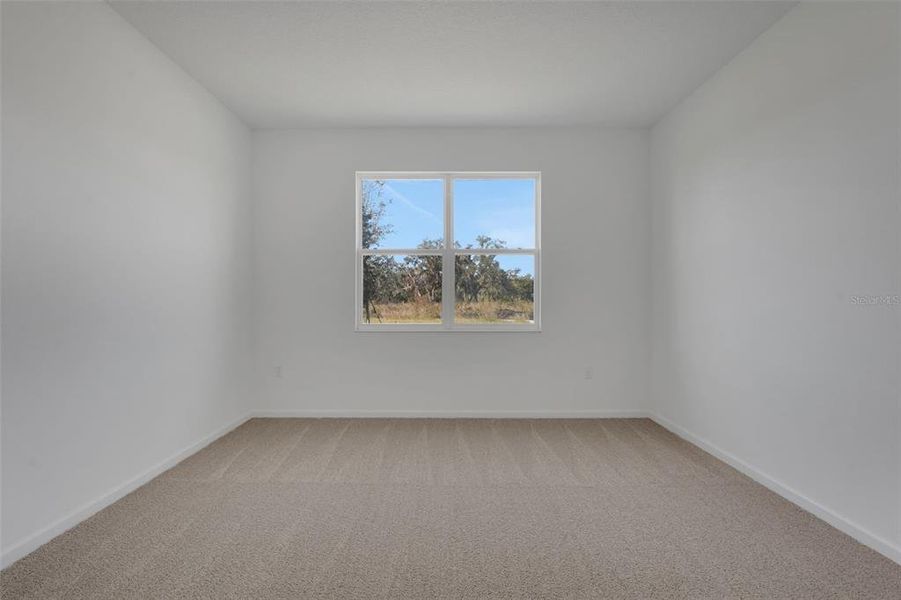 Spacious, unfurnished interior of a new home in Willowbrook North, Winter Haven (Image 11).
