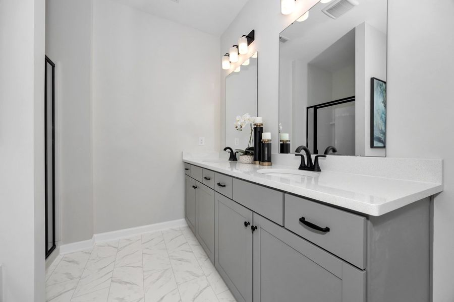 Representative furnished interior of a home built from the The Hampton by Smith Douglas Homes in La Segarra, Brookshire (Image 15).