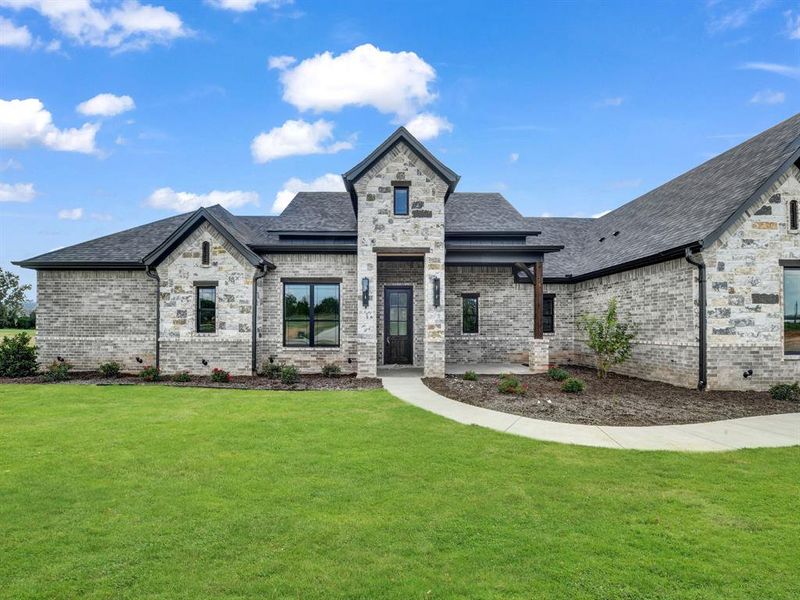 Front exterior of a new home in , Weatherford, TX, highlighting curb appeal (Image 24).