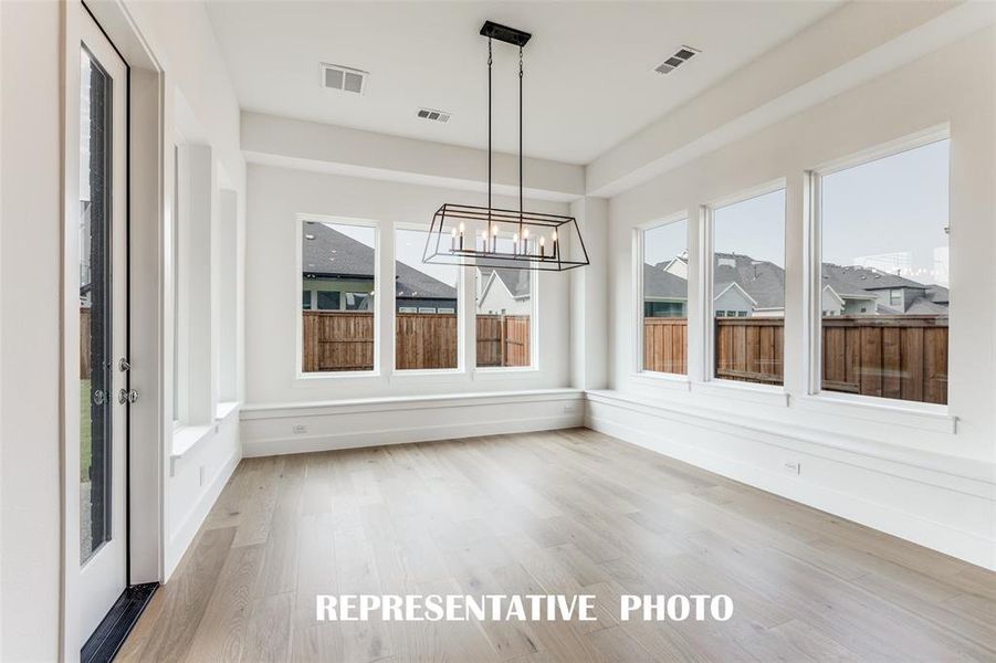 Whether it's grand dinner parties or cozy family meals, this dining room checks all the boxes!  REPRESENTATIVE PHOTO