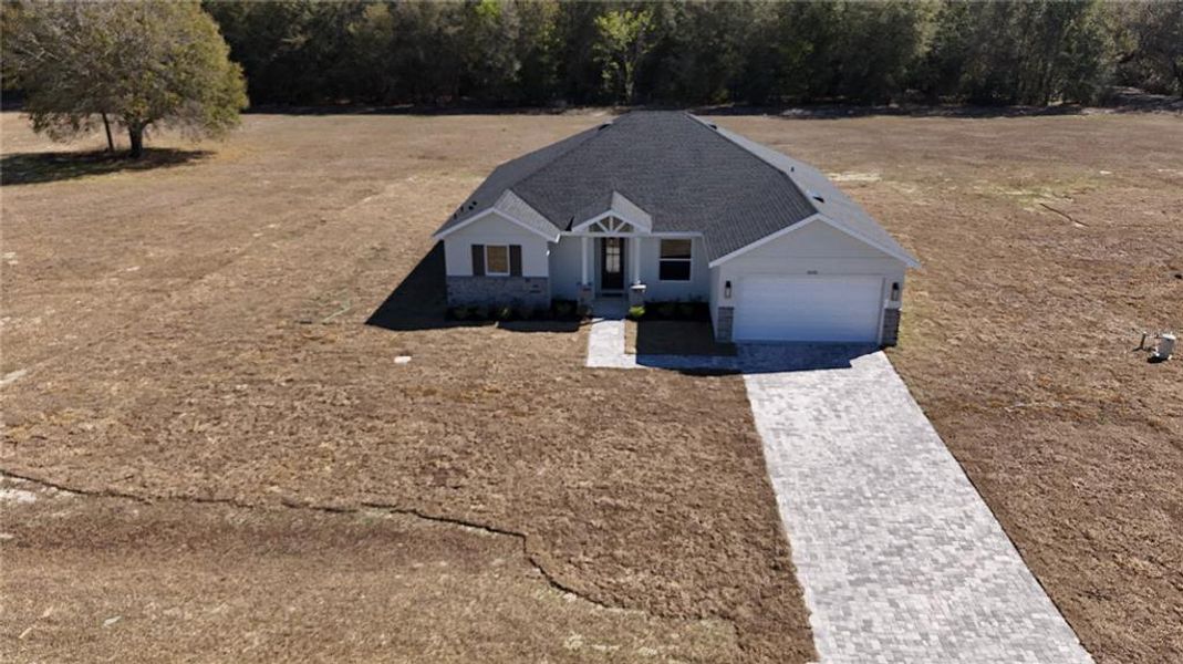 Front exterior of a new home in , Webster, FL, highlighting curb appeal (Image 13). Front exterior of a new home in , Webster, FL, highlighting curb appeal (Image 13).