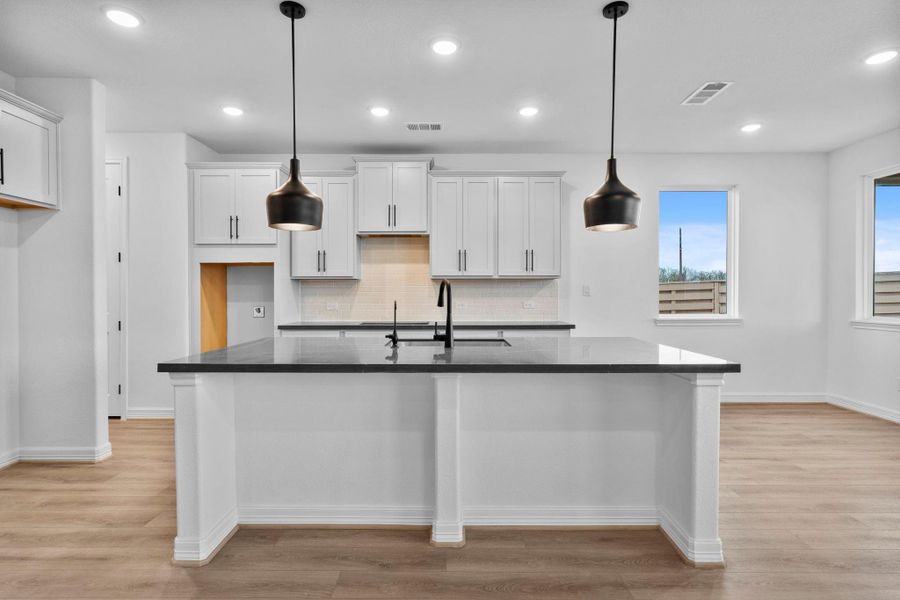Not only is this kitchen's contemporary design elite, the function is also top tier. Not only is this kitchen's contemporary design elite, the function is also top tier.