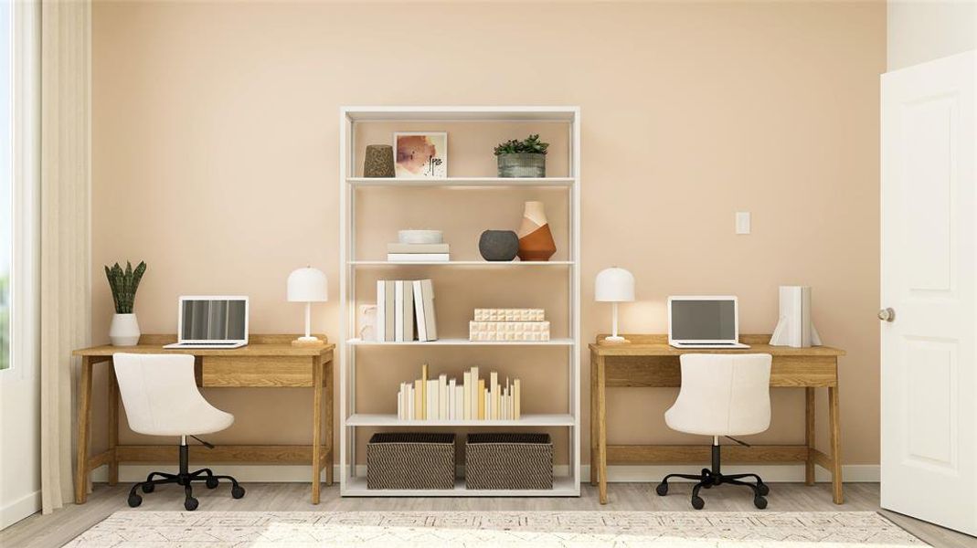 Home office with hardwood / wood-style flooring