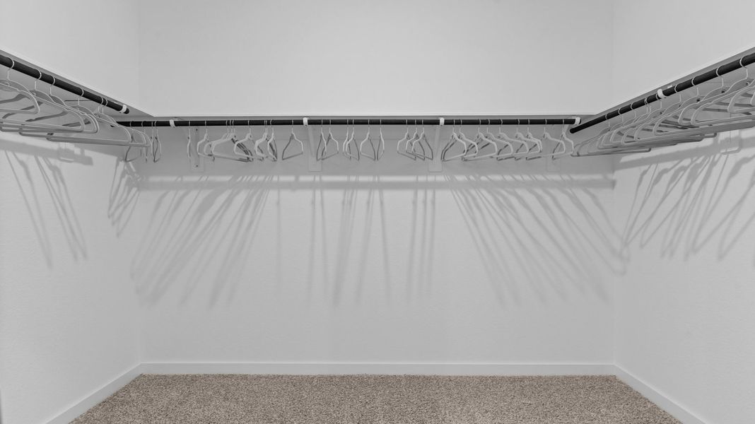 Spacious, unfurnished interior of a new home in Caldwell Crossing, Iowa Colony (Image 18).