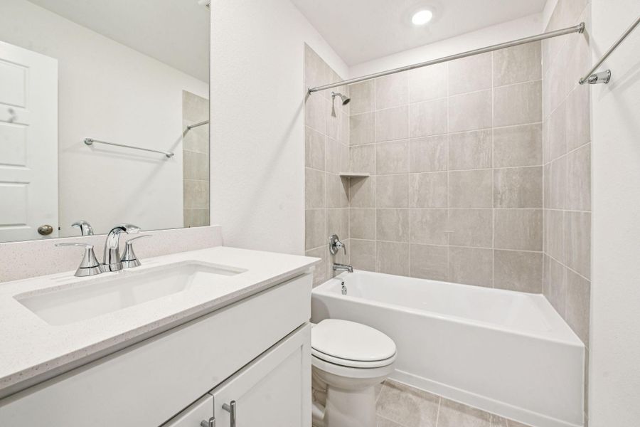 Furnished interior view inside a new home in Granger Pointe - Traditional Series, Conroe (Image 11).