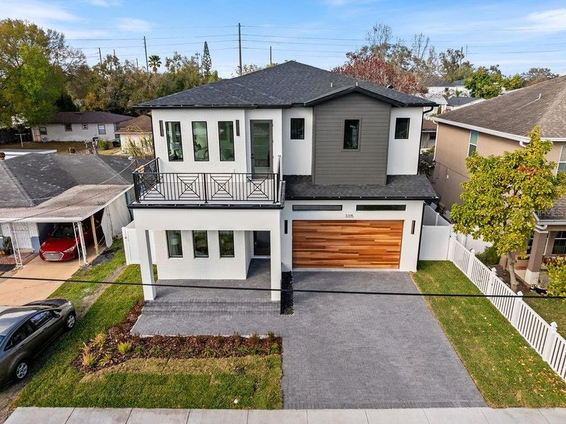 Front exterior of a new home in , Tampa, FL, highlighting curb appeal (Image 26). Front exterior of a new home in , Tampa, FL, highlighting curb appeal (Image 26).