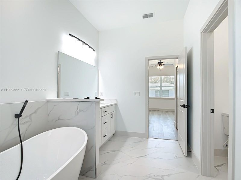 Furnished interior view inside a new home in , Port Charlotte (Image 5).