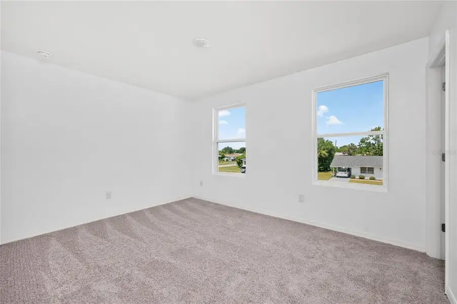 Spacious, unfurnished interior of a new home in , Port Charlotte (Image 45).