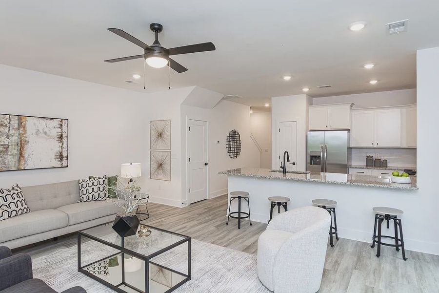 Representative furnished interior of a home built from the 1557 Townhome by Adams Homes in Parkstone Place Townhomes, Roebuck (Image 10).