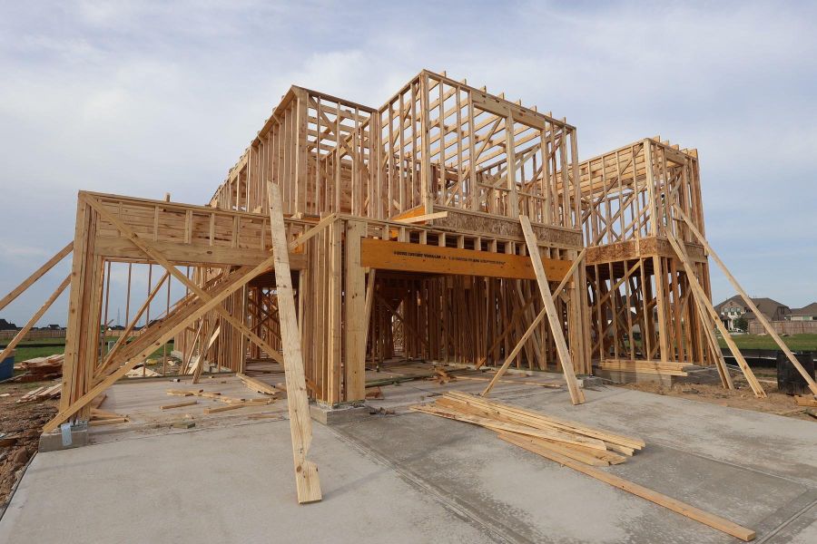 Two story home with 5 beds, 4.5 baths, and 4 car tandem garage