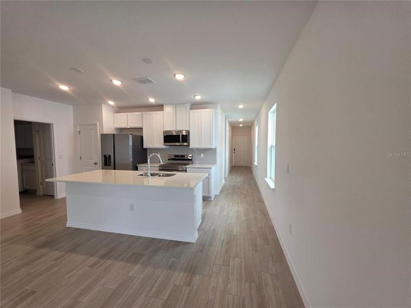 Furnished interior view inside a new home in Hammock Reserve, Haines City (Image 5).