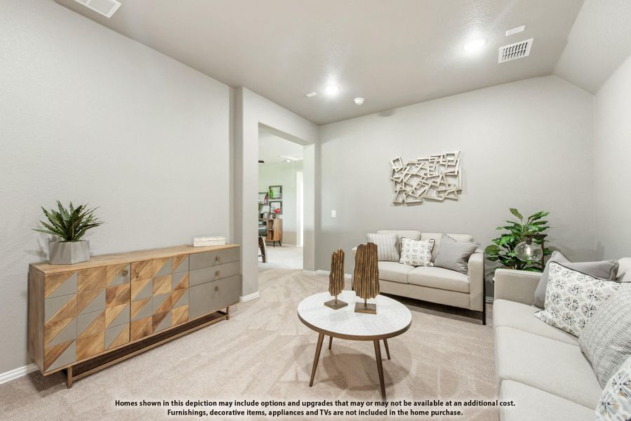 Living room with neutral carpet, sofa, round coffee table, and decorative sideboard cabinet Living room with neutral carpet, sofa, round coffee table, and decorative sideboard cabinet