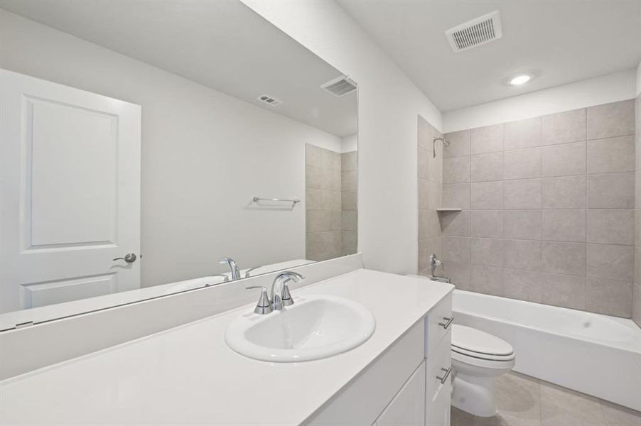 Photo is not of the actual home, but is an inspirational photo of builder’s model home and may depict options, furnishings, and/or decorator features that are not included.