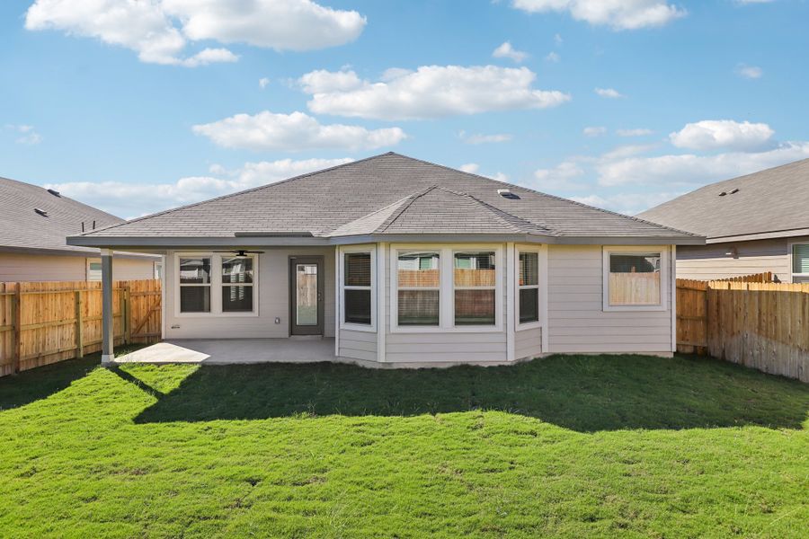 Back exterior of the Oleander floorplan at a Meritage Homes community. Back exterior of the Oleander floorplan at a Meritage Homes community.
