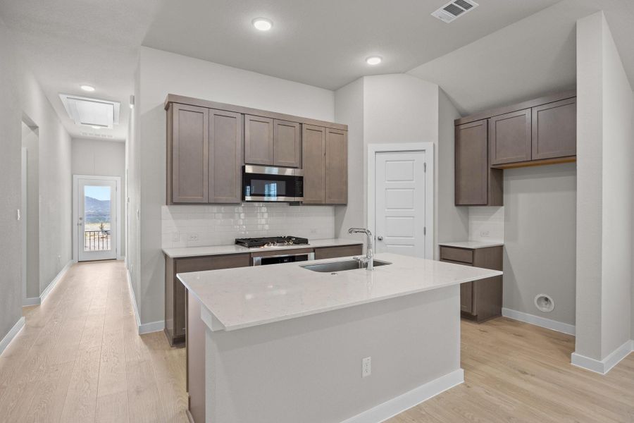 Furnished interior view inside a new home in Lakeside at Tessera, Lago Vista (Image 6).