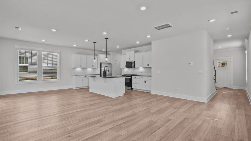 Representative unfurnished interior of a home built from the Jasmine by DRB Homes in Pleasant Falls, Moore (Image 21).