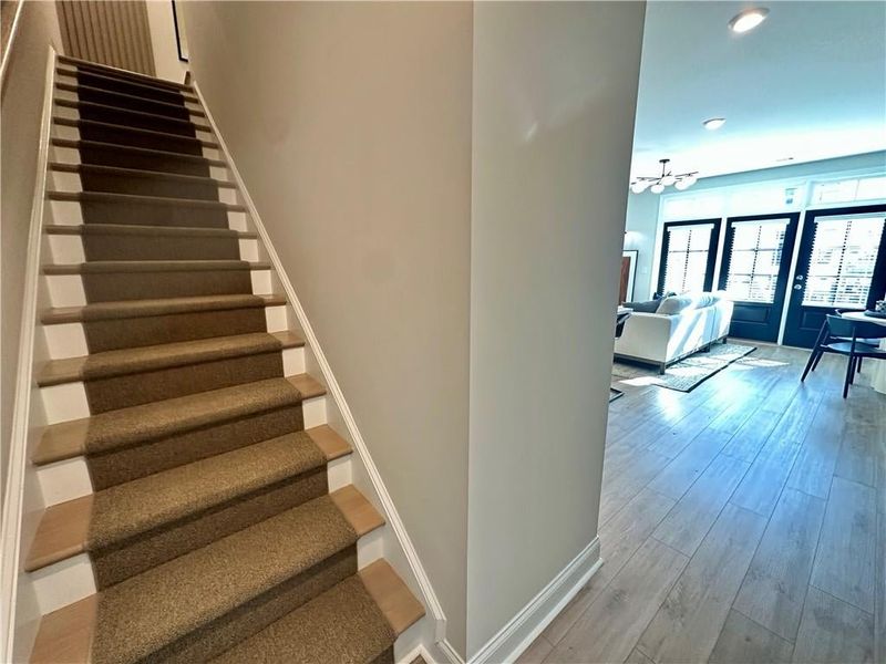 Stair Runners are standard for TPG Homes *Images shown are from a decorated model of the same floor plan. Design selections and color packages will vary by home.*