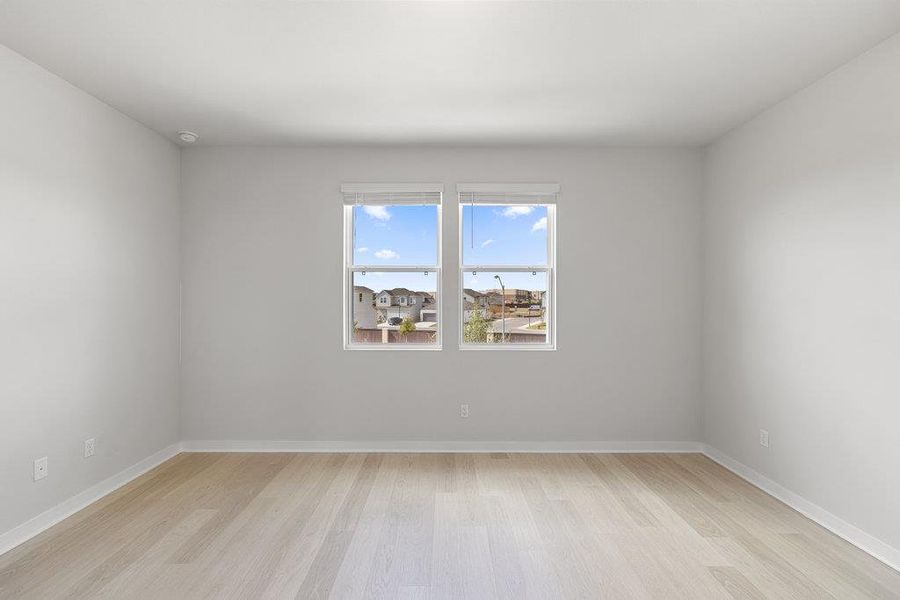 Unfurnished room featuring light wood finished floors