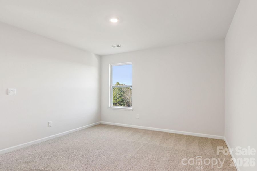 Spacious, unfurnished interior of a new home in Rydele Heights, Asheville (Image 18).