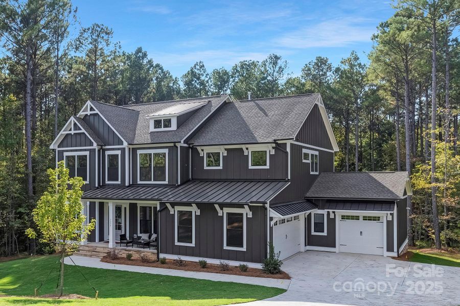 Front exterior of a new home in , Lancaster, SC, highlighting curb appeal (Image 1).