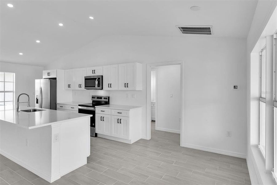 Furnished interior view inside a new home in , Cape Coral (Image 10).