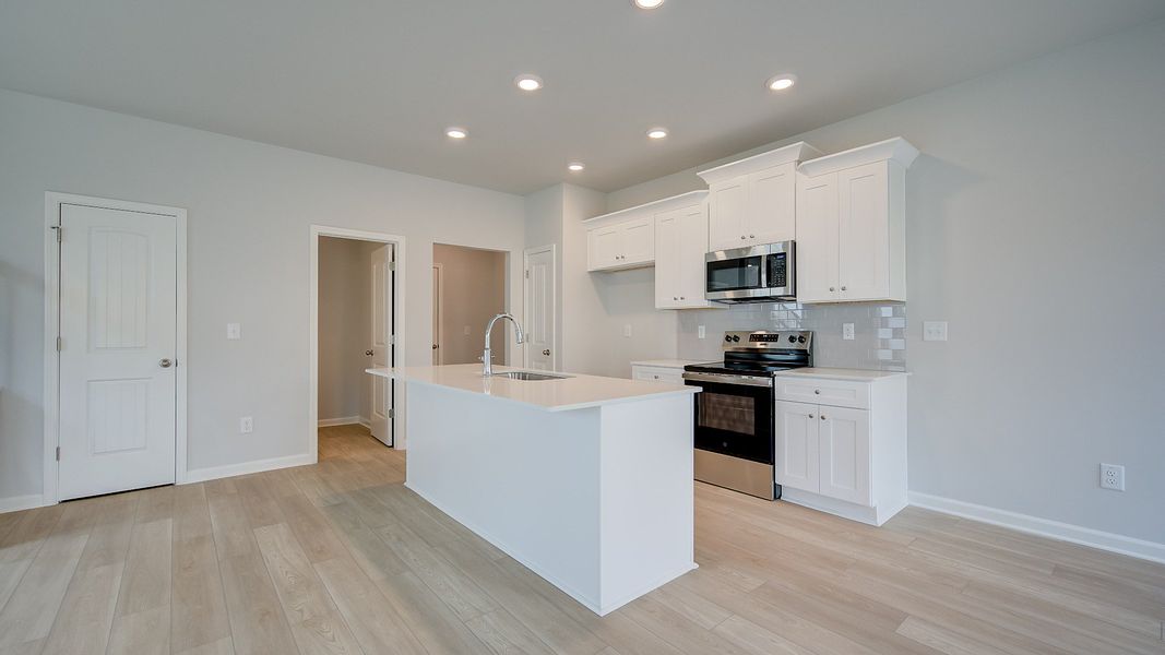 Furnished interior view inside a new home in Bowers Farm Townhomes, McDonough (Image 10).