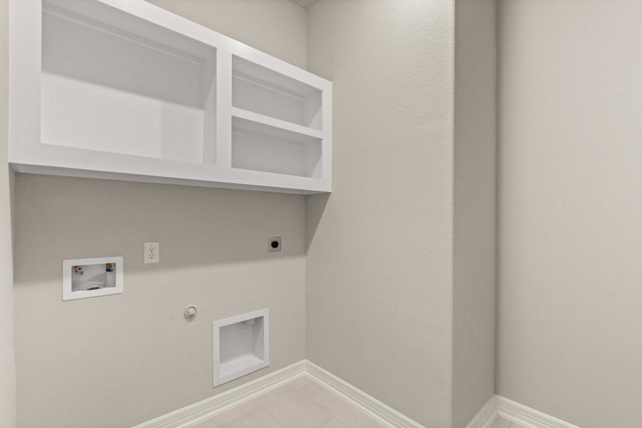 Utility room. Note: Sample product photo - actual exterior and interior selections may vary.