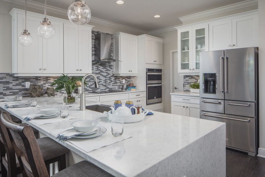 Representative furnished interior of a home built from the Tarpon II by Jones Homes USA in Reserve at Twin Lakes, St. Cloud (Image 4).