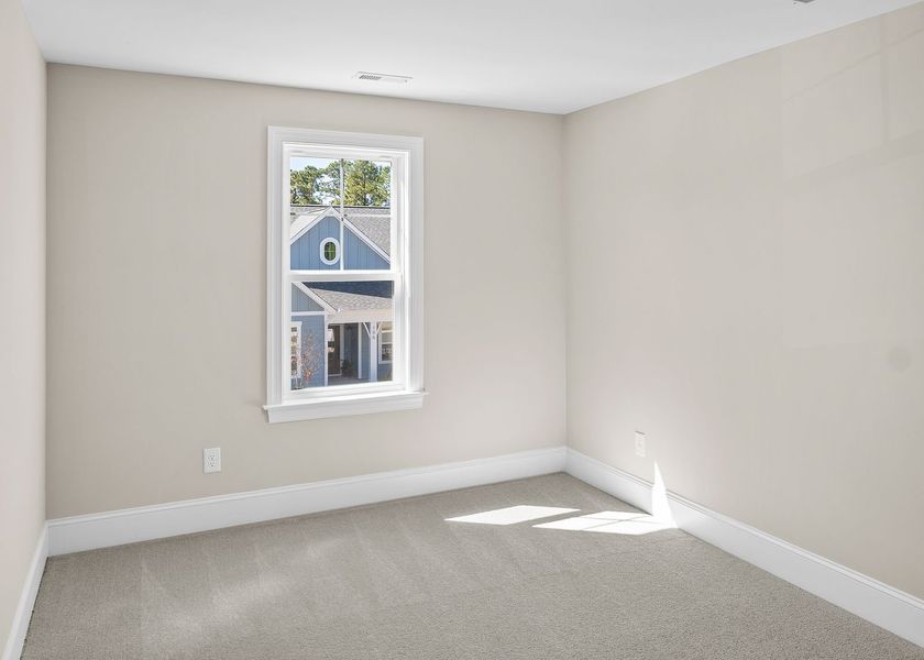 Spacious, unfurnished interior of a new home in Carolina Creek, Hampstead (Image 32).